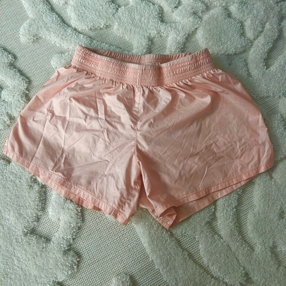 NIKE Peach Lined Running Shorts - Picture 1 of 3